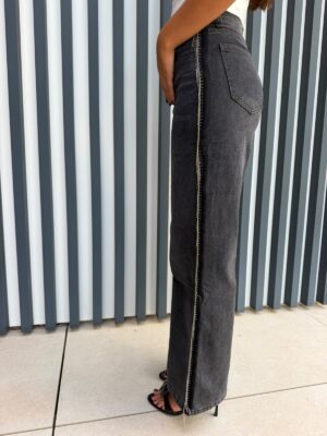Pantalón vaquero flecos