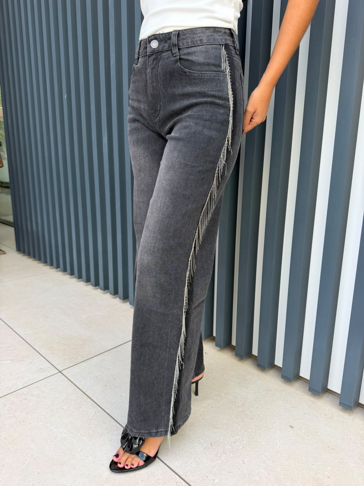 Pantalón vaquero flecos