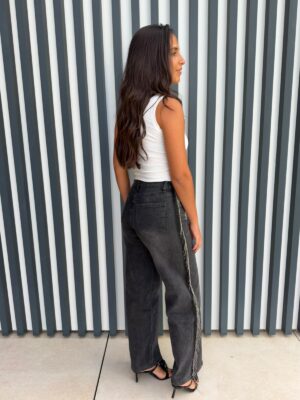 Pantalón vaquero flecos