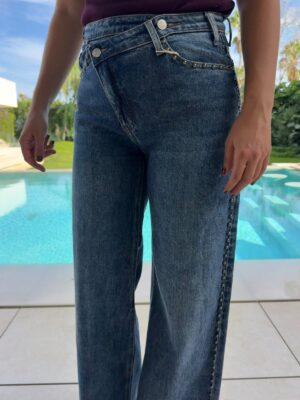 Pantalón vaquero tachuelas